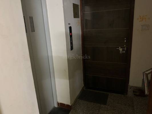 Bed in a 2 Bhk apartment Kardhani Govindpura - Room interior