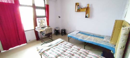 Bed in a 3 Bhk apartment Banshipuri - Common area